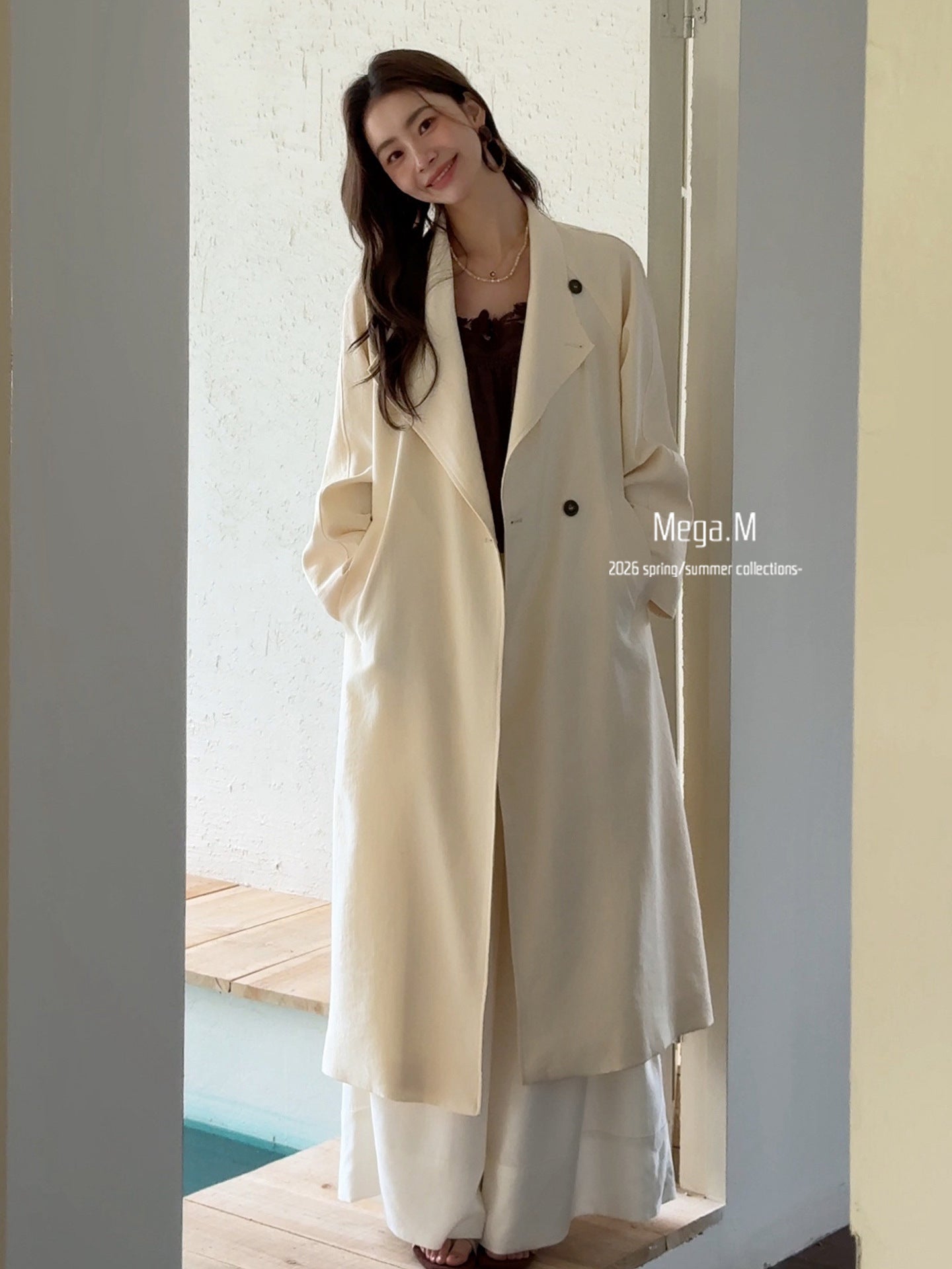 Mag dream, medium and long lapel trench coat 2026 spring new Korean version knee button long sleeve jacket women's clothing